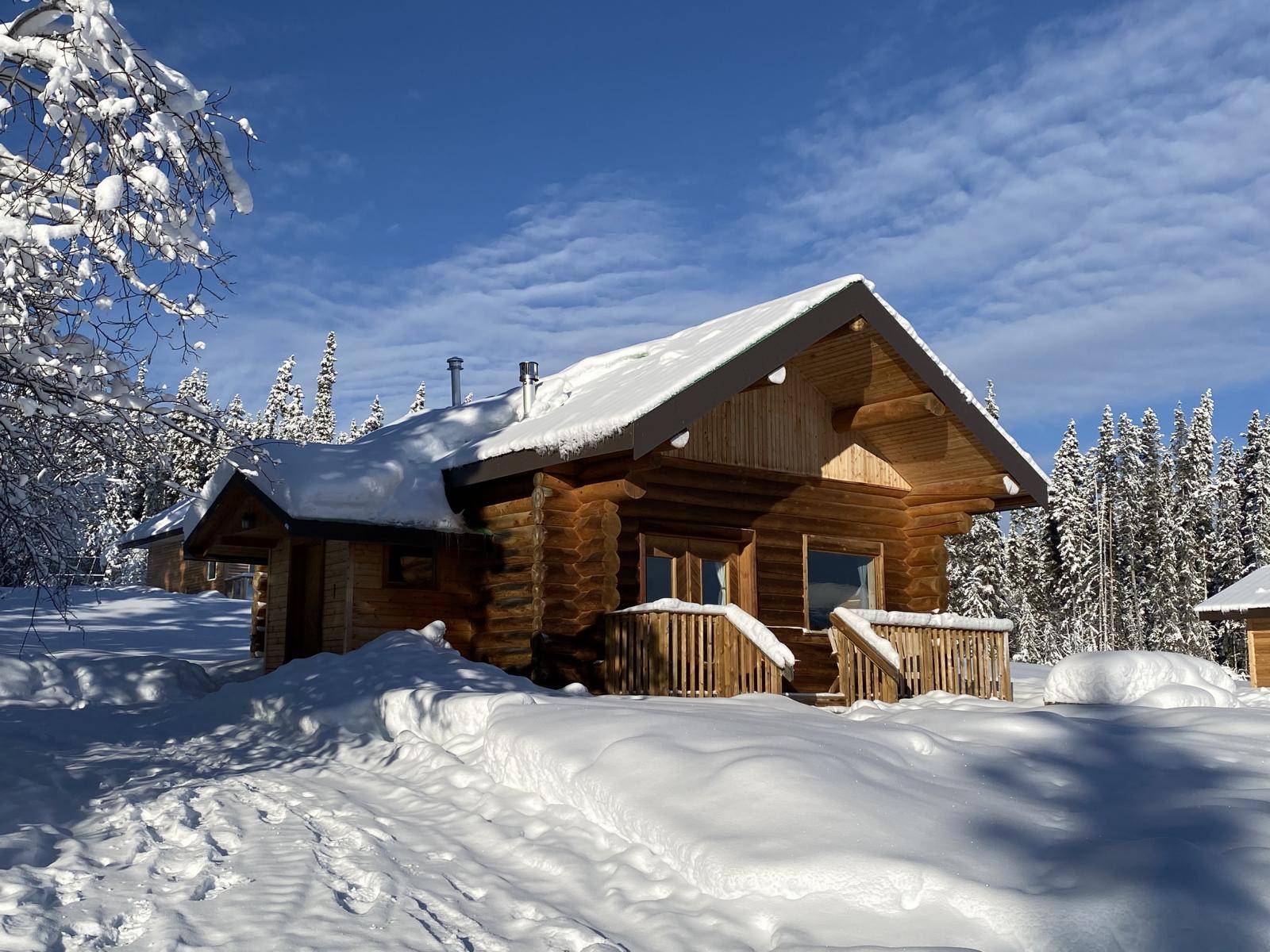 Front view of the family cabin in winter
