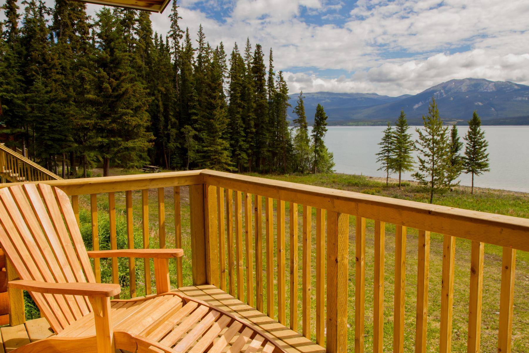 View from the porch of a standard cabin to the lake in summer