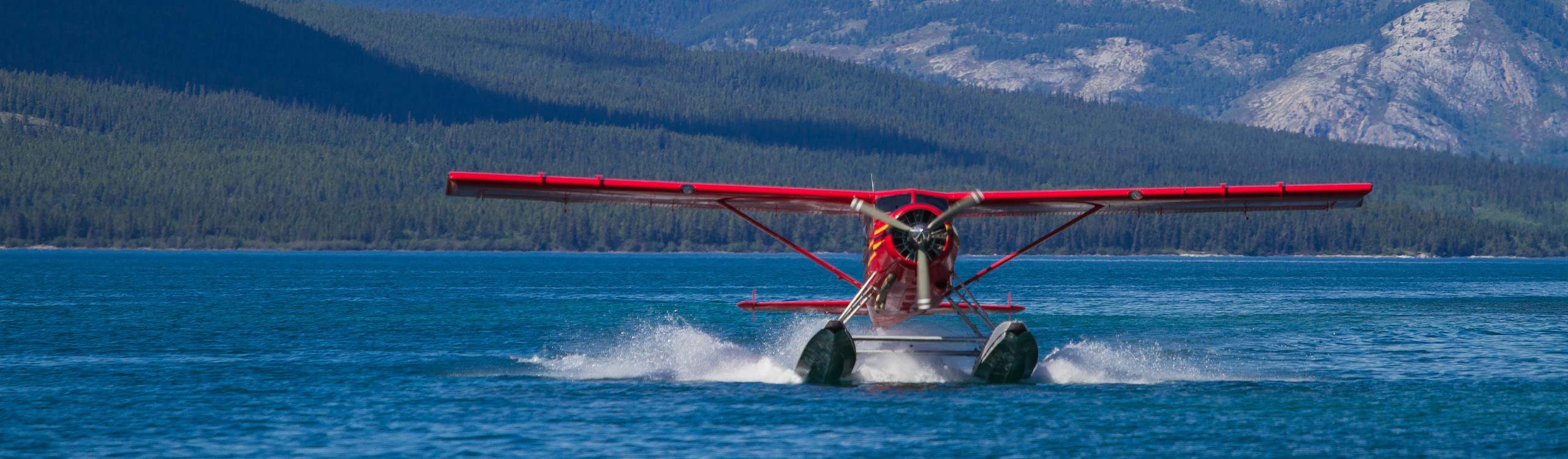 Landing float plane on a lake